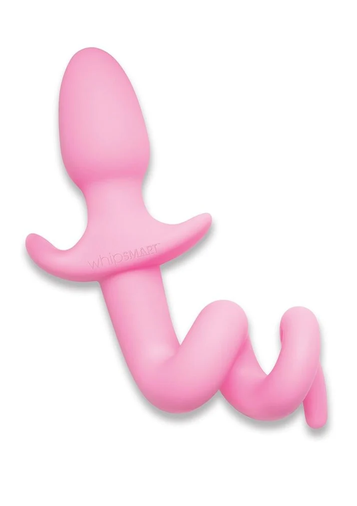 Pink silicone piggy tail butt plug